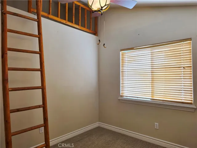 Bedroom 2 showing bonus loft