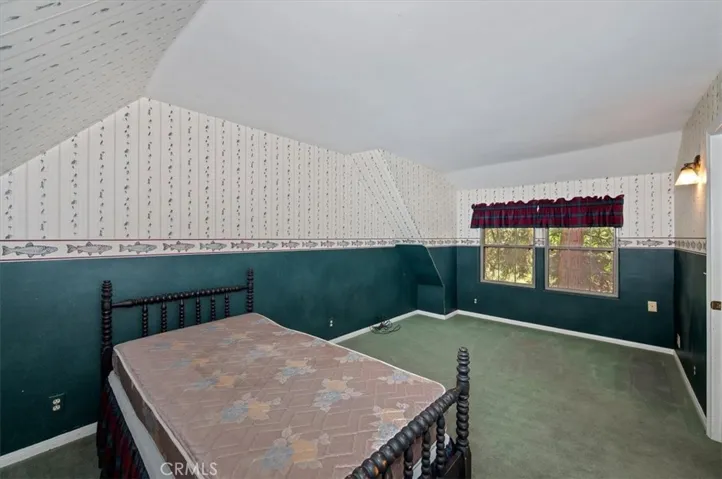 upstairs bedroom on left