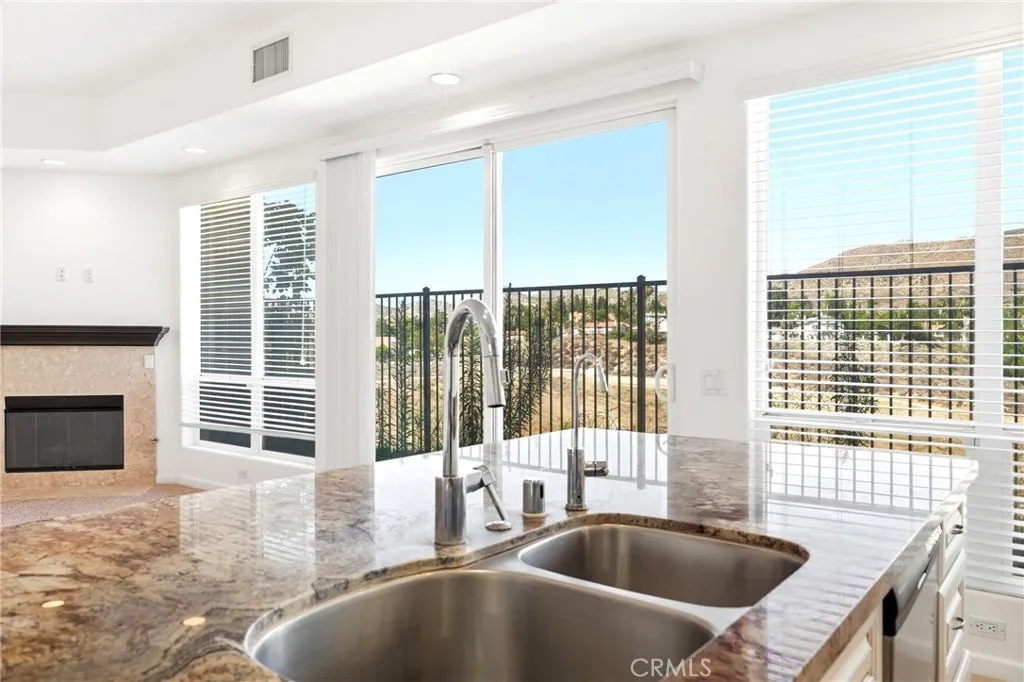 Kitchen with a gorgeous view of the hills and city