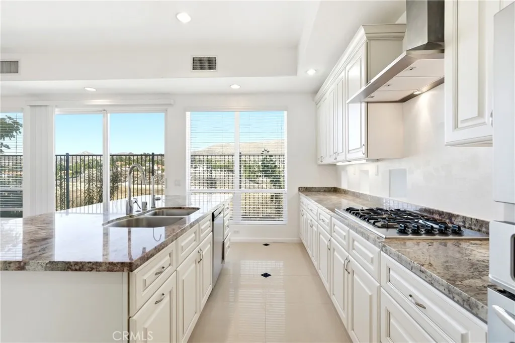 Kitchen with a gorgeous view of the hills and city