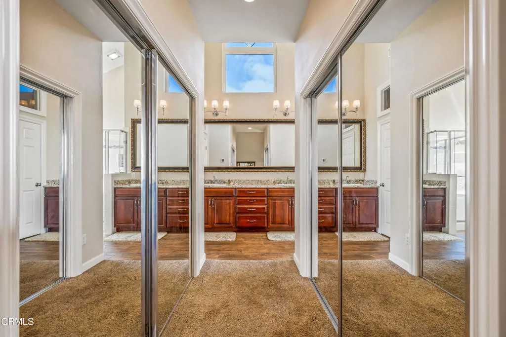 Primary Bedroom Walk-in Closets