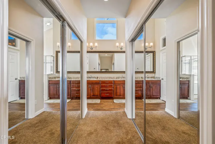 Primary Bedroom Walk-in Closets