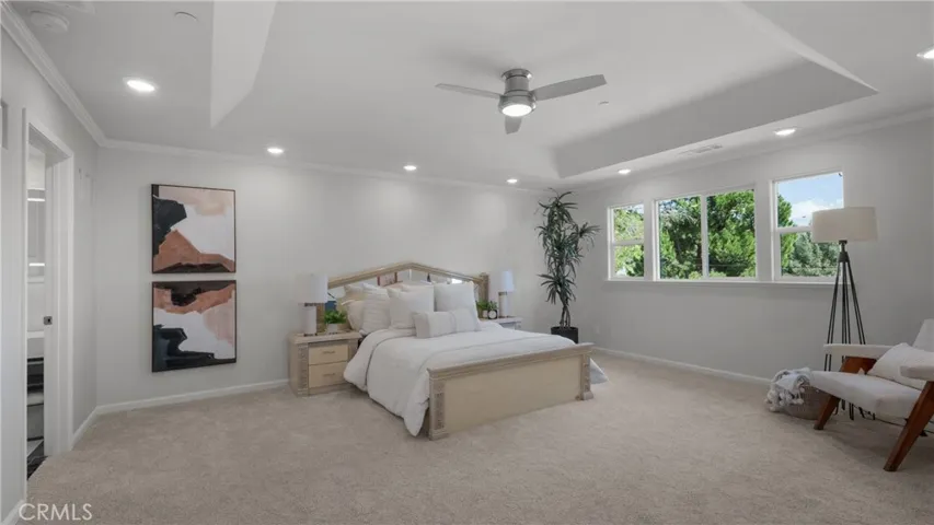 Primary bedroom suite features large walk-in closet a fireplace for amazing ambiance... and a spa inspired batrhroom.