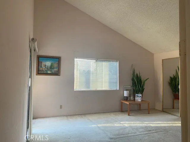 Big Master suit, vaulted ceiling with slide door to private Balcony with beautiful palm trees...