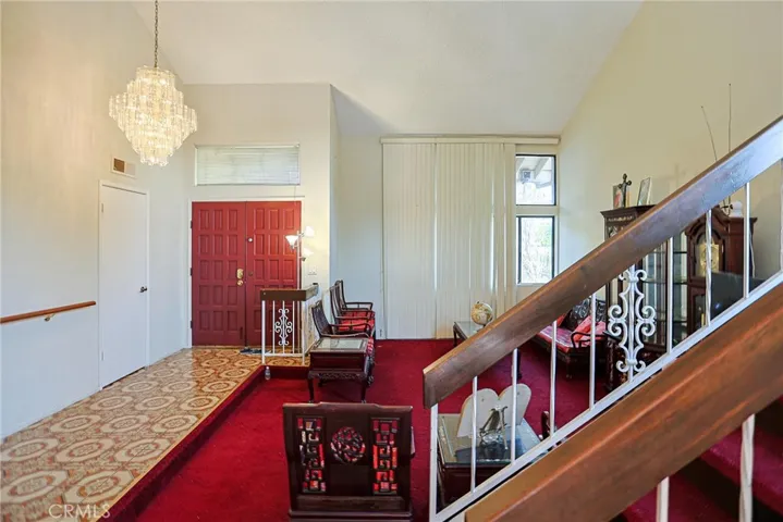 Spacious living room with beautiful stair
