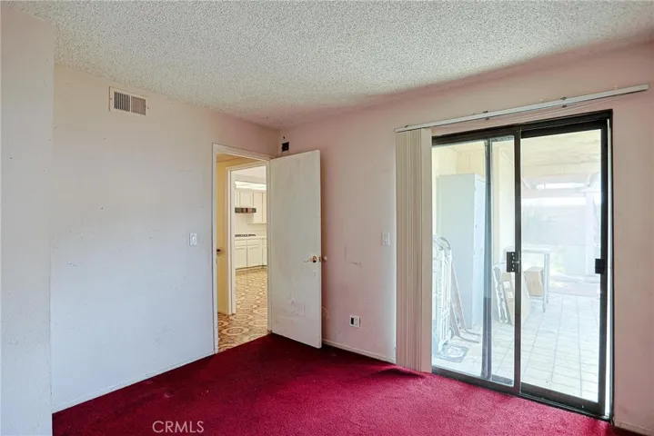 Downstair Bedroom to Patio, to backyard, barbecue grill
