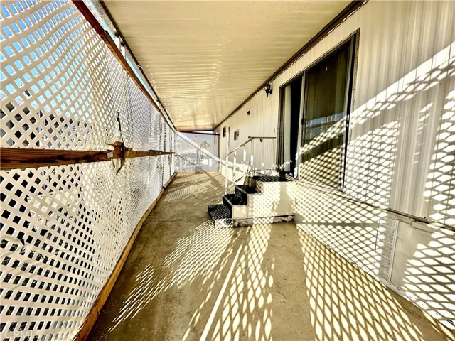 View from Front door towards the end, showing the stair to doorway
