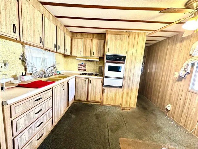Mid shot of kitchen and dining