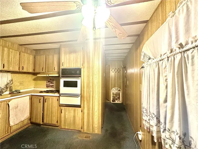 Midshot of dining and kitchen