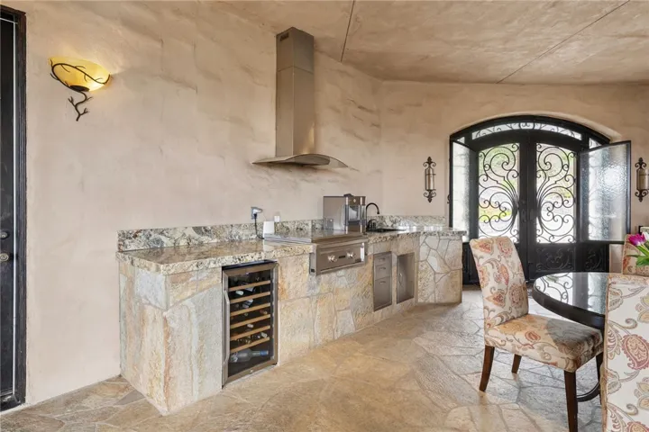 Enclosed breezeway beer keg, BBQ, refrigerators