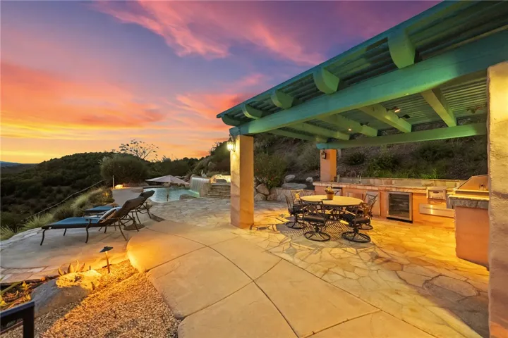 Outdoor kitchen next to pool