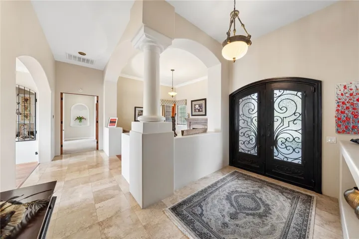 Double door entry, travertine floors
