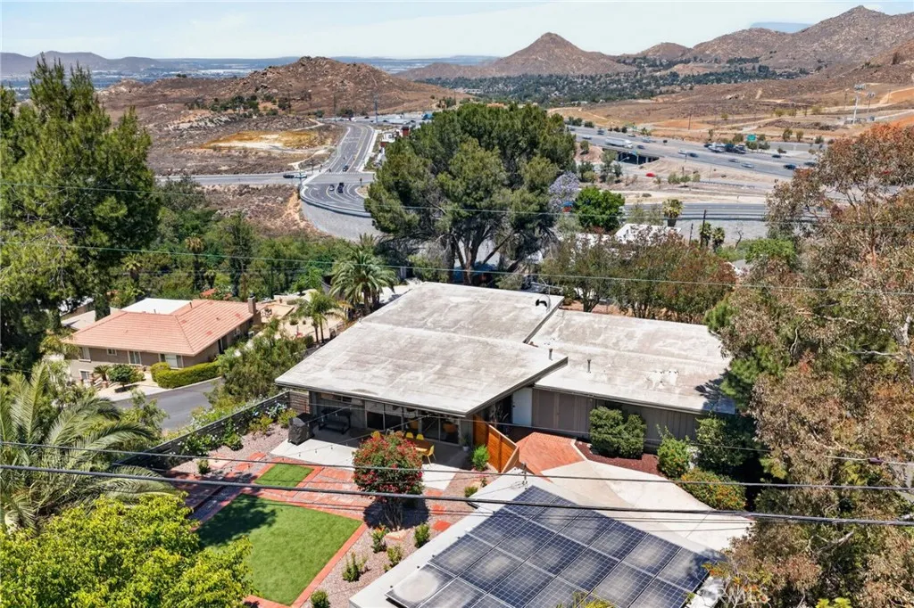 Owned Solar Panels on the garage roof provide free electricity.