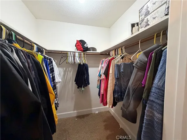 Primary Bedroom walk-in closet