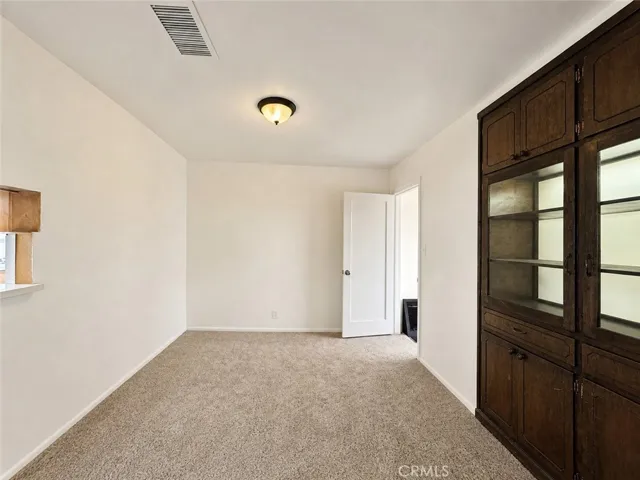 Curios cabinet and living room
