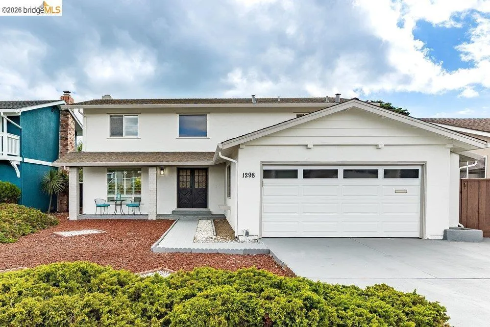 Contemporary two-story residence with an attached two-car garage