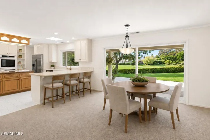 Dining Area Virtually Staged + White Wal
