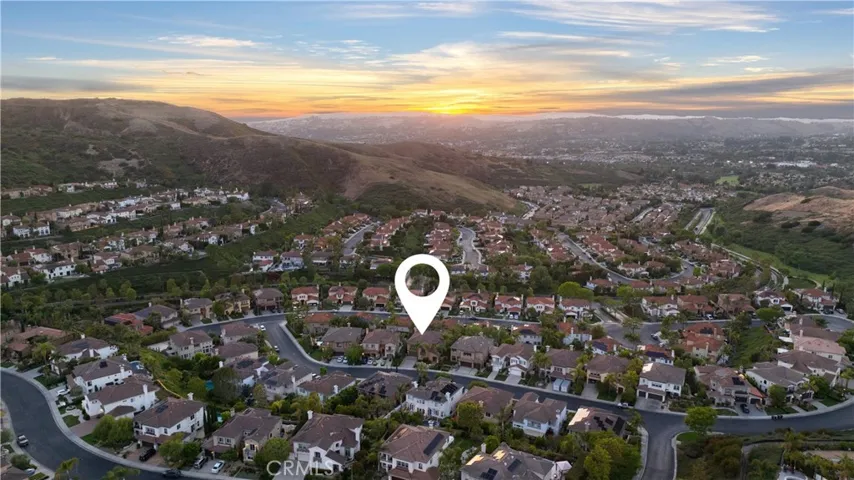 Ideally situated within the gated community of San Juan Hills Estates, surrounded by rolling hills and picturesque neighborhood views