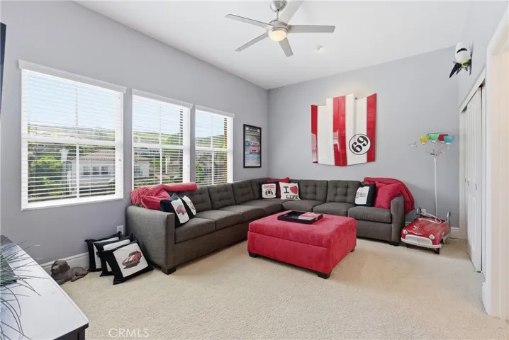 Secondary bedroom with multiple windows