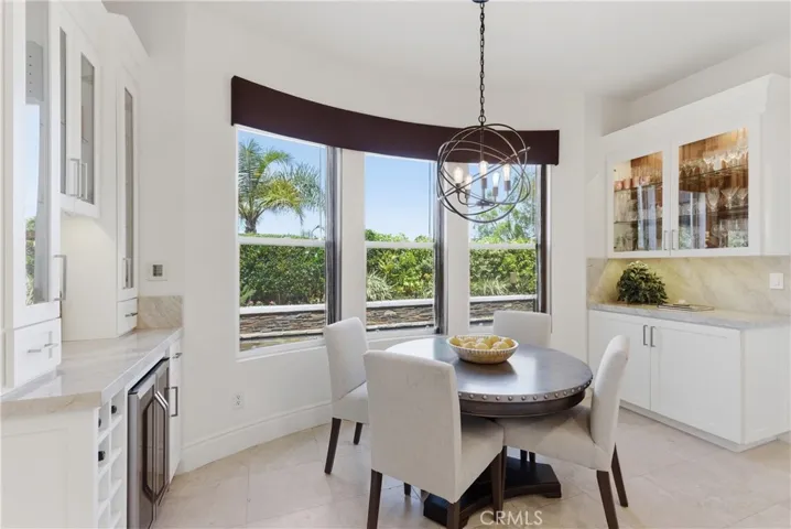Light-filled breakfast nook overlooking the private backyard
