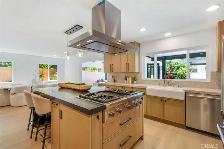 Chef's kitchen with full premium Thermador appliance suite | 305 Robinhood Ln., Eastside Costa Mesa 92627