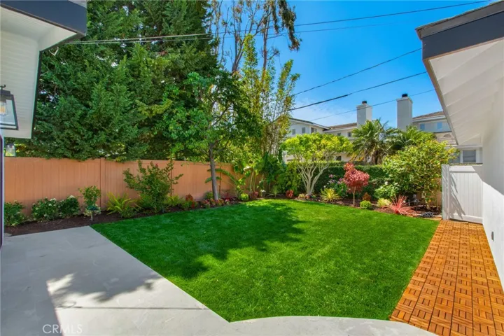 All-new landscaping with full irrigation and integrated landscape lighting | 305 Robinhood Ln., Eastside Costa Mesa 92627