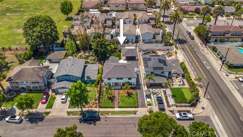 erial showing property within Eastside Costa Mesa neighborhood. Photo digitally altered: arrow added to identify subject property. | 305 Robinhood Ln., Eastside Costa Mesa 92627
