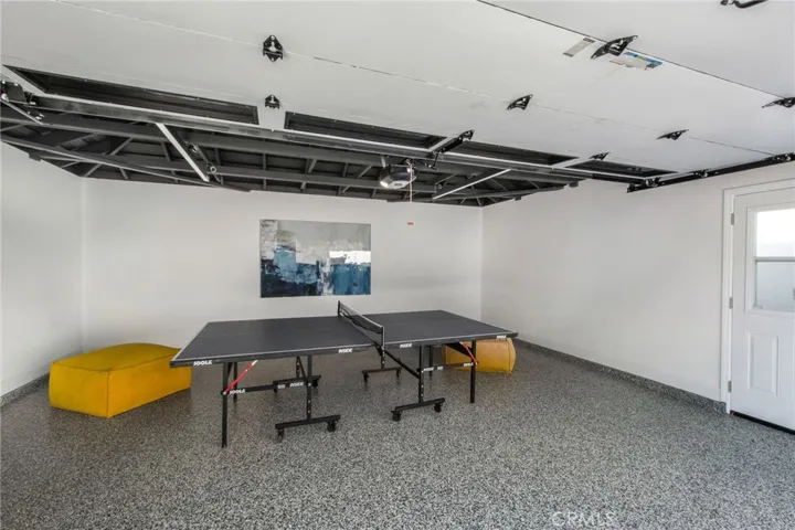 Detached structure styled for flex use as a recreation room, gym, or studio | 305 Robinhood Ln., Eastside Costa Mesa 92627