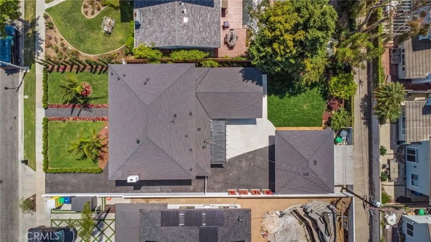 Aerial view of the full property and 7,910 square foot lot | 305 Robinhood Ln., Eastside Costa Mesa 92627