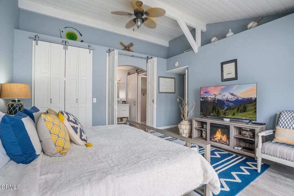 Barn doors hide  closet and bath