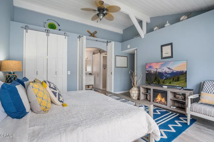 Barn doors hide  closet and bath