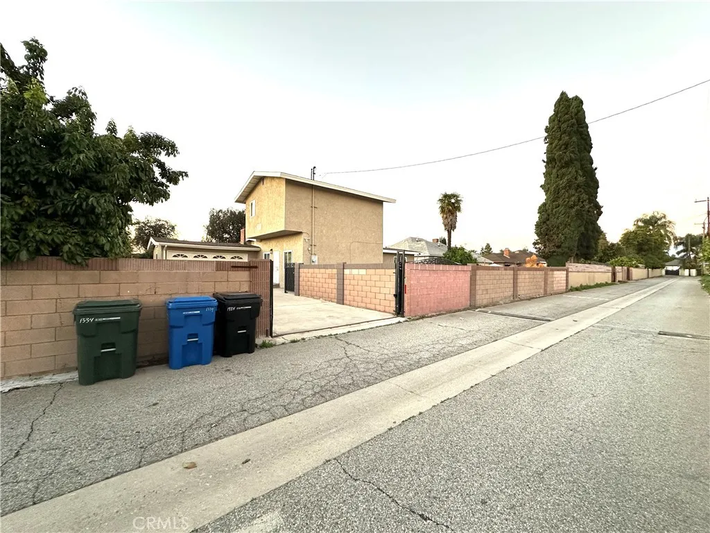 Back alley to gated driveway
