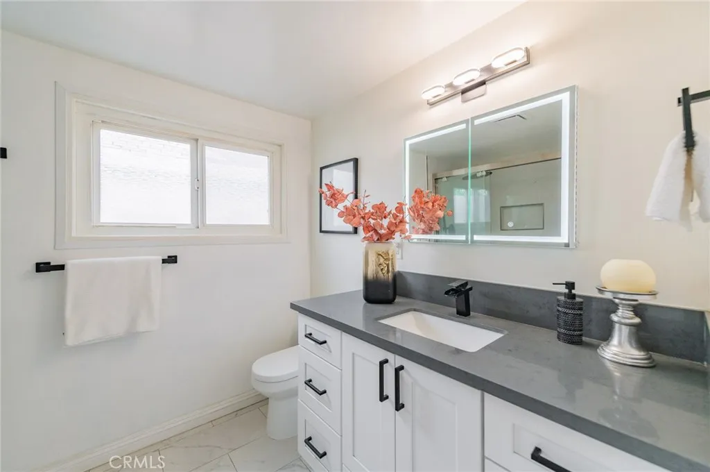 Bathroom 2 (downstairs) - short compact toilet (esp for elder/child), quiet exhaust fan, LED lighted mirror with touch sensor medicine cabinet