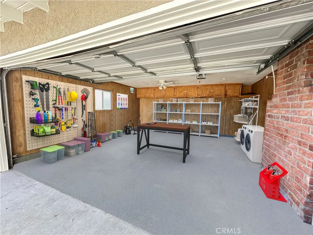 2-car garage & work shop- laundry hookup in place (virtually staged)