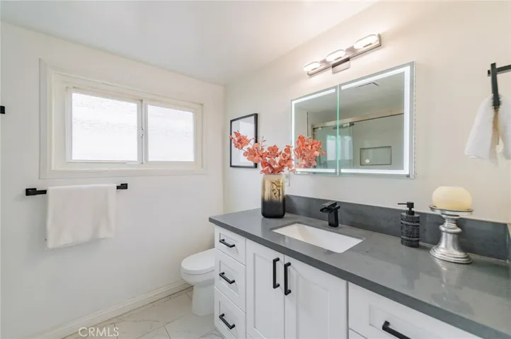 Bathroom 2 (downstairs) - short compact toilet (esp for elder/child), quiet exhaust fan, LED lighted mirror with touch sensor medicine cabinet
