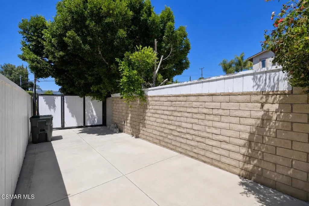 side yard with private gate