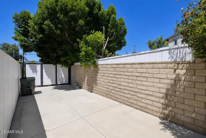side yard with private gate