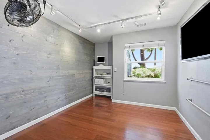 3rd bedroom, on bottom floor, used as rec room.