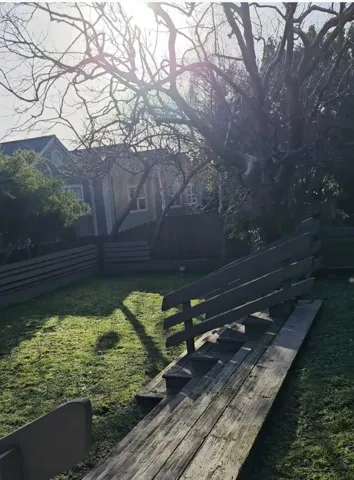 Grassy area in Tot Lot.  Great for picnic parties. Residents may reserve.