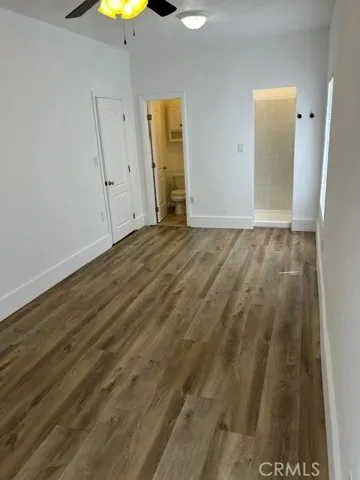 Bedroom with a full bathroom.