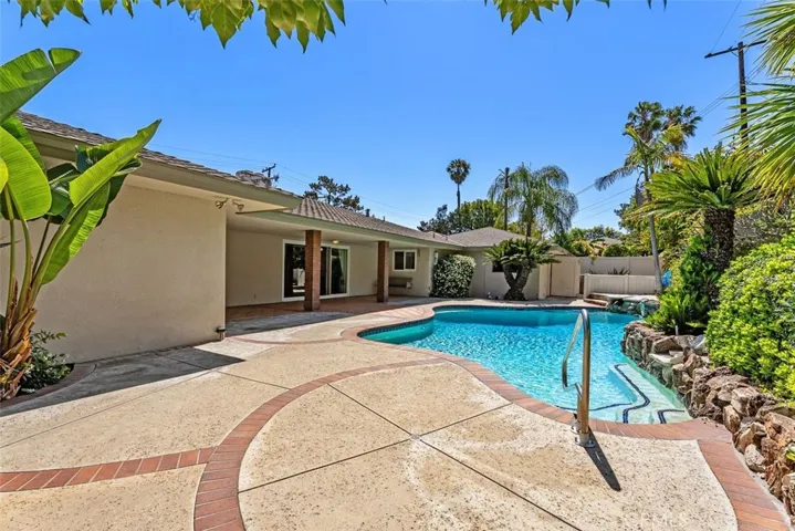 This spacious backyard is perfect for gathering or just maintaining privacy.