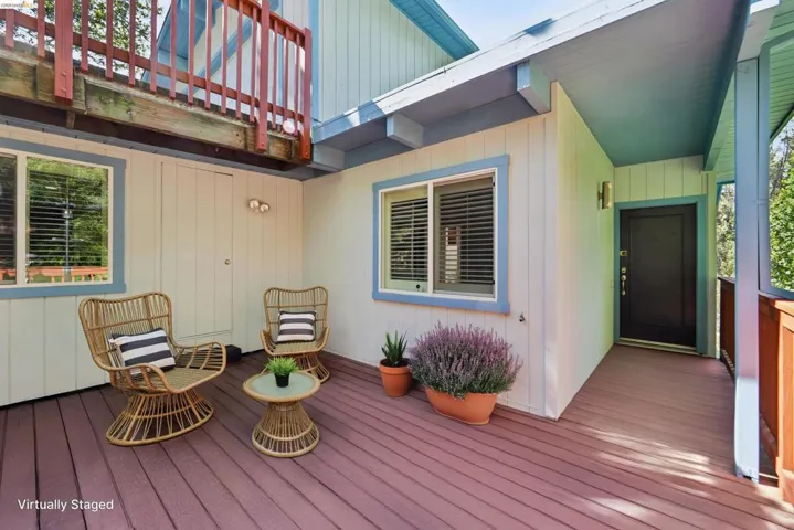 Expansive outdoor deck space with a rich reddish-brown finish