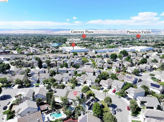 Residential area featuring multiple single-family homes with pitched roofs