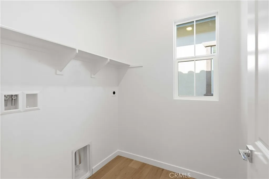 3rd Level Laundry Room with window