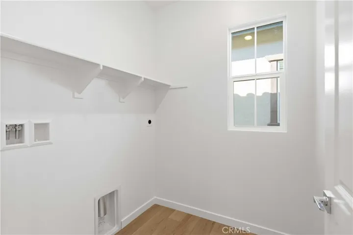 3rd Level Laundry Room with window