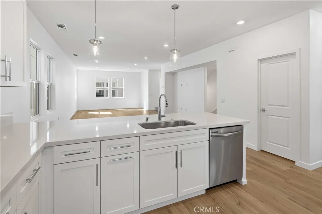 Kitchen open to dining and living area