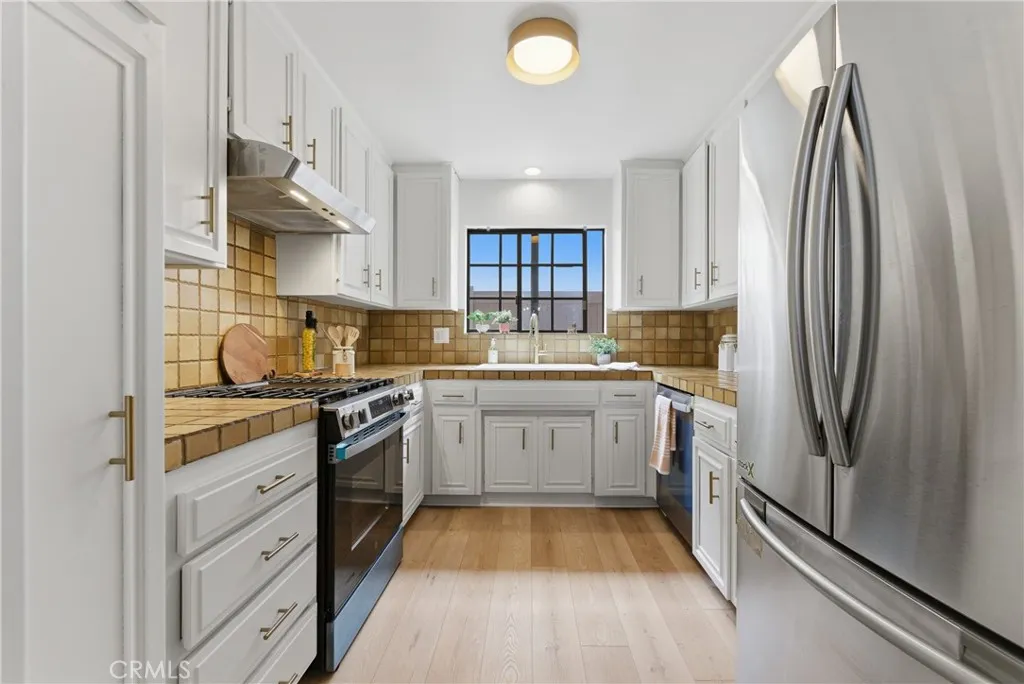 kitchen with vintage tile and New Sink, fixtures...