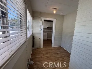 Another view of Laundry Room with door leading to Kitchen from the back
