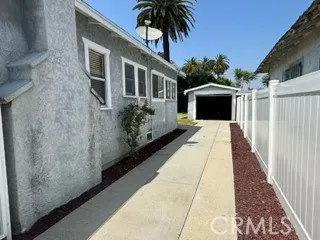 Front of house view of five car drive way