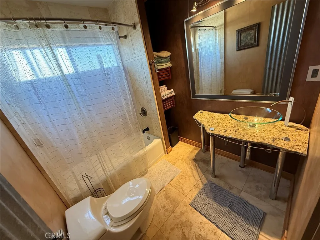 Modern remodeled bathroom with tub and shower